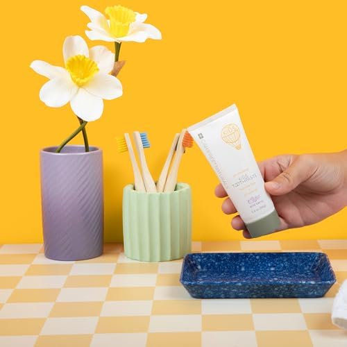 CariFree Naturals Kids Toothpaste | Fluoride-Free, 40% Xylitol, Organic Wild Berry Flavor, pH Elevated, Safe if Swallowed, Sugar-Free, 2.4 oz, Made in The USA